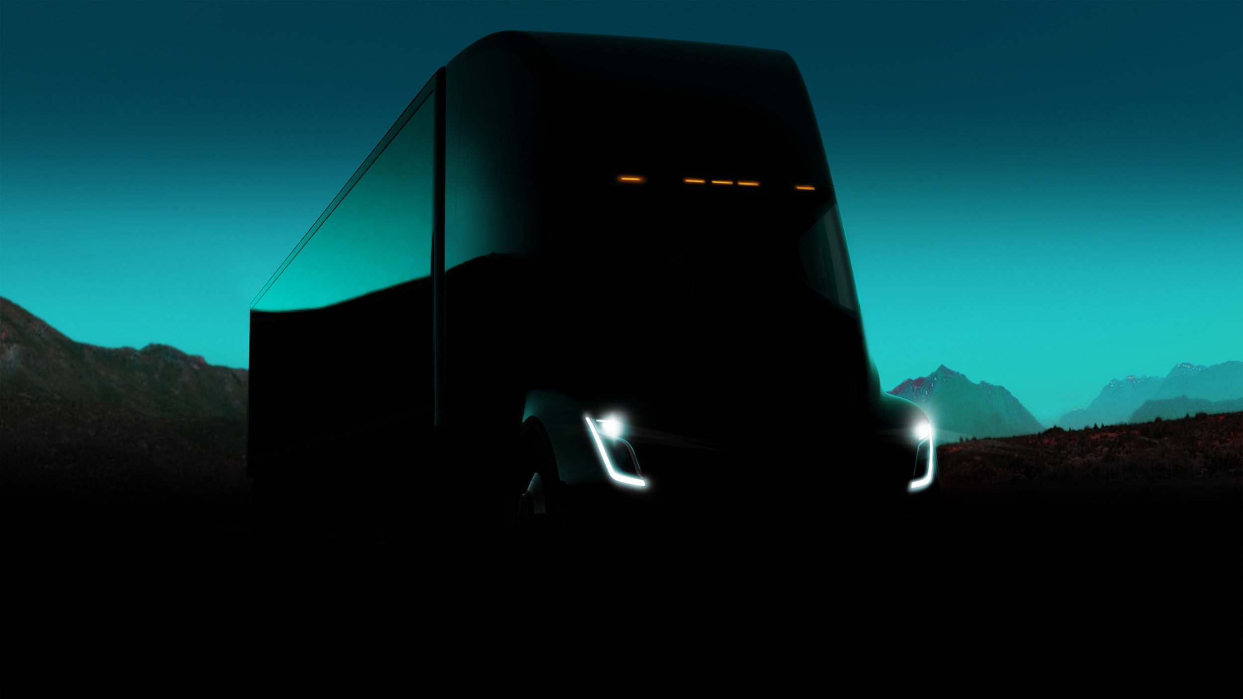 A dark background photograph of a Tesla Semi-Truck